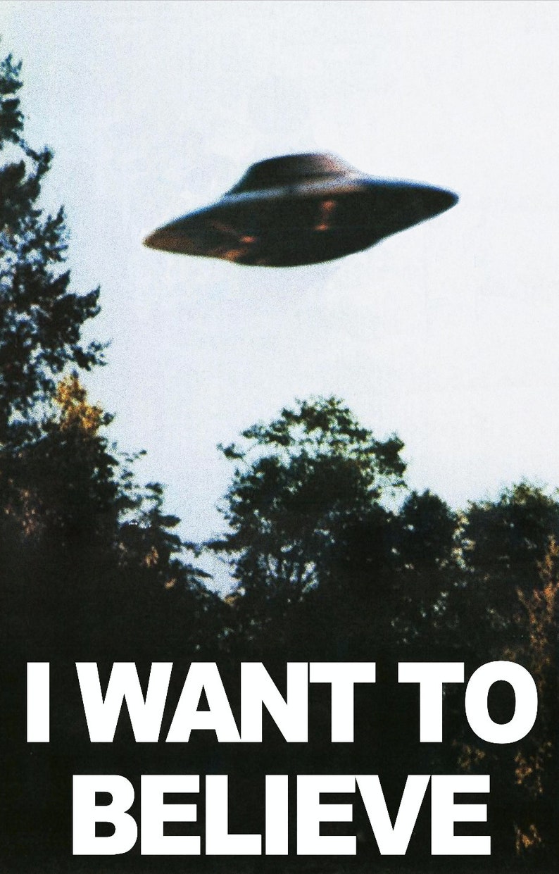 May include: A black and white image of a flying saucer with the text "I WANT TO BELIEVE" below it.