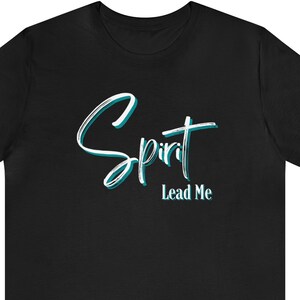 May include: Black t-shirt with a teal blue and white graphic that says "Spirit Lead Me".