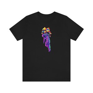 May include: A black t-shirt with a colorful illustration of an astronaut with a cluster of mushrooms growing on their head.