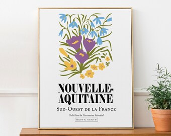 May include: A white poster featuring a floral illustration of purple, yellow, and blue flowers. The text "NOUVELLE-AQUITAINE" is in black, with the text "SUD-OUEST DE LA FRANCE" and "Collection du Patrimoine Mondial" in smaller black text below. The coordinates "44.8378° N, -0.5792° W" are printed at the bottom.