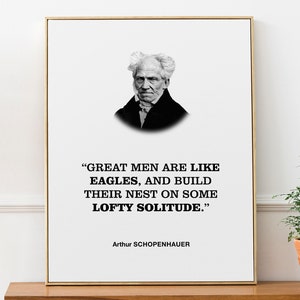 Plakat z inspirującym cytatem Arthura Schopenhauera „Wielcy ludzie są jak orły i budują swoje gniazda w jakiejś wzniosłej samotności”.
