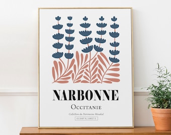 May include: A framed print with a minimalist design featuring stylised blue flowers and pink leaves. The print has the text "NARBONNE", "OCCITANIE", "Collection du Patrimoine Mondial", and "43.1840° N, 3.0032° E".