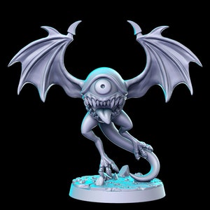 May include: A gray, one-eyed monster with a toothy grin and a long tail. The monster has bat-like wings and is standing on a circular base.