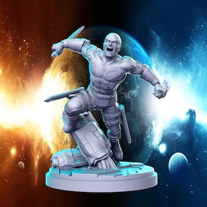 May include: A gray, detailed miniature figurine of a bald, muscular figure with a fierce expression, holding a sword in each hand. The figure is standing on a circular base with a textured surface. The background is a blurry image of a planet with a bright orange and blue glow.