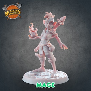 May include: A pink painted miniature figurine of a female mage with pointed ears, holding a flaming orb in one hand and a staff in the other. The figurine is standing on a round base with the word "MAGE" printed on it.