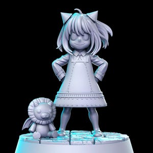May include: A gray 3D printed figurine of a girl with cat ears and a dress, standing on a platform with a gray lion figurine.