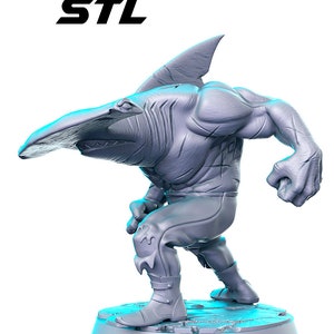 May include: A gray 3D printed figurine of a humanoid shark with a hammerhead. The shark is wearing pants and boots and is in a fighting pose. The figurine is standing on a circular base.