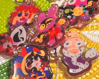 The Amazing Digital Guns? TADC Glitter Epoxy Keychains - Pomni Jax Ragatha Kinger Caine Zooble Gangle