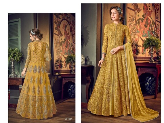 DESIGNER DRESS FOR HALDI FUNCTION EXCLSUIVE YELLOW DESIGNER LONG KURTI GOWN  AT WHOLESALE RATES