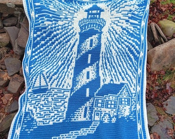 Patrón de manta de crochet con mosaico superpuesto de faro solitario