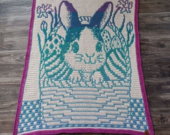 Patrón de manta de crochet con diseño de conejito sorpresa para bebé o niño pequeño