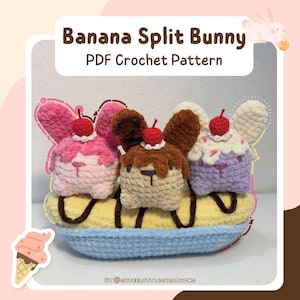 May include: A crocheted banana split bunny with pink, brown, and purple bunny heads, each topped with a cherry. The banana split sits on a blue base. Text reads "Banana Split Bunny PDF Crochet Pattern".