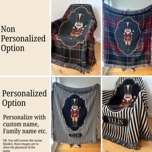May include: A woven throw blanket featuring a nutcracker design within a decorative frame. The blanket is available in plaid and striped patterns, with fringed edges. The personalized option includes a custom name.