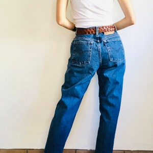 Vintage LEVIS 550 Jeans, 30 Waist, 90s Medium Stonewash Blue High Waisted Tapered Mom Denim