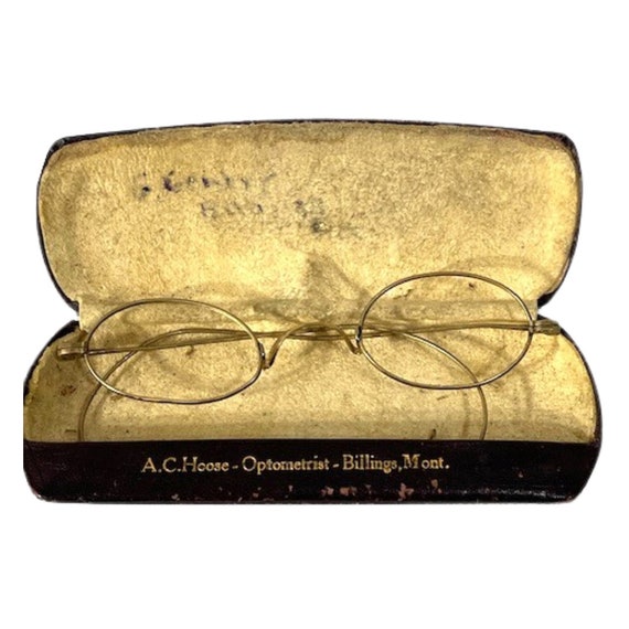 Antique metal eyeglass frames.