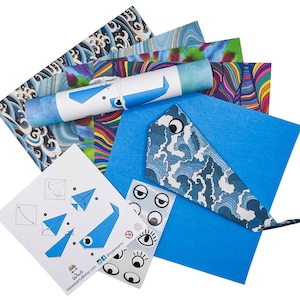Peut inclure: Un kit d'origami baleine bleu avec du papier &agrave; motifs, des instructions et des yeux mobiles. Le kit comprend une feuille de papier bleu, une feuille de papier &agrave; motifs, une feuille d'instructions et une feuille d'yeux mobiles. Le kit est parfait pour les enfants qui aiment bricoler.