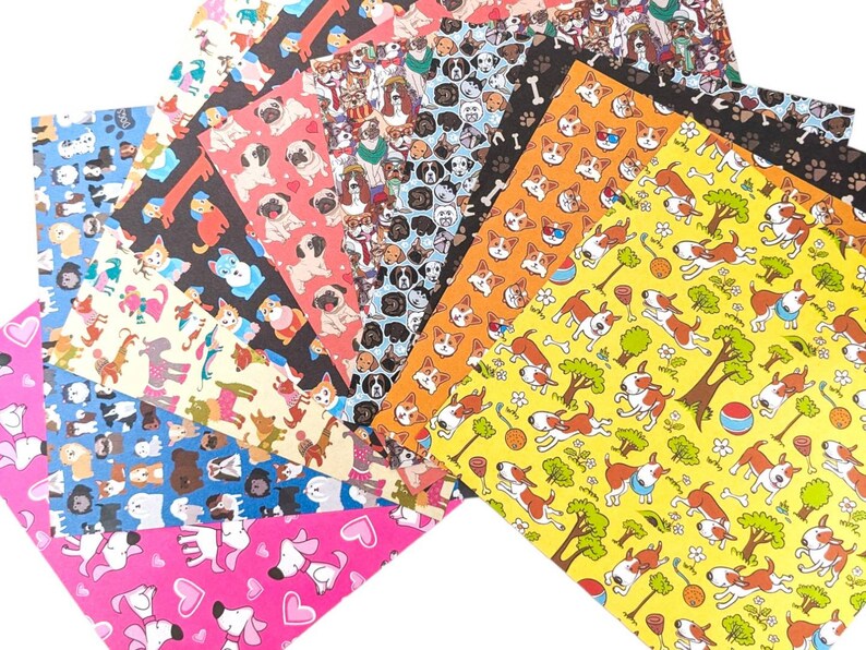 Pode incluir: Um conjunto de 10 pap&eacute;is estampados coloridos com diferentes ra&ccedil;as de c&atilde;es. Os pap&eacute;is s&atilde;o impressos com diferentes ra&ccedil;as de c&atilde;es, incluindo carlinhos, bulldogs e terriers. Os pap&eacute;is s&atilde;o perfeitos para scrapbooking, fazer cart&otilde;es e outros projetos de artesanato.