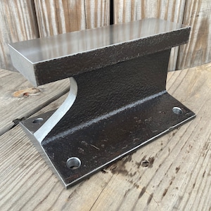 Knife makers anvil. With mounting holes and overhang