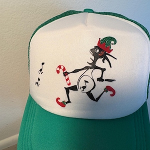 Casquette trucker de Noël en mousse Note Eater