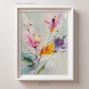 Peut inclure: Peinture à l'aquarelle florale encadrée. L'œuvre présente des fleurs roses, jaunes et violettes avec des feuilles et des tiges vertes sur un fond bleu clair et gris. Le cadre est blanc, et le texte "high resolution" est en haut.
