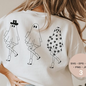 Könnte beinhalten: Ein weißes Sweatshirt mit drei schwarzen und weißen Geisterillustrationen. Die Geister tragen verschiedene Outfits, darunter einen Cowboyhut, ein Blumenkleid und ein schlichtes Kleid. Der Text "SVG - EPS - DXF - PNG - JPG 3" ist unten rechts auf dem Sweatshirt aufgedruckt.