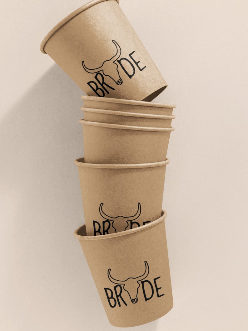 May include: Stack of six brown paper cups with a black bull skull and the word "BRIDE" printed on each cup.