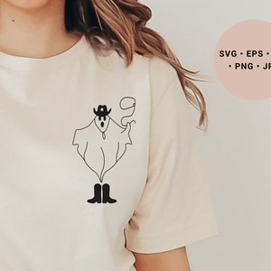 May include: A white t-shirt with a black line drawing of a ghost wearing a cowboy hat and boots. The ghost is holding a lasso in its right hand. The text "SVG - EPS - DXF - PNG - JPG" is in the upper right corner of the image.