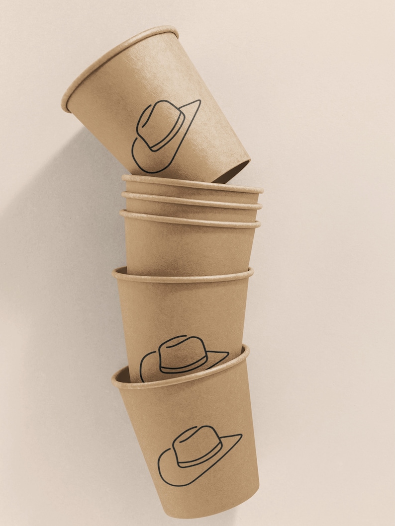 May include: A stack of six brown paper cups with a black line drawing of a cowboy hat on each cup.