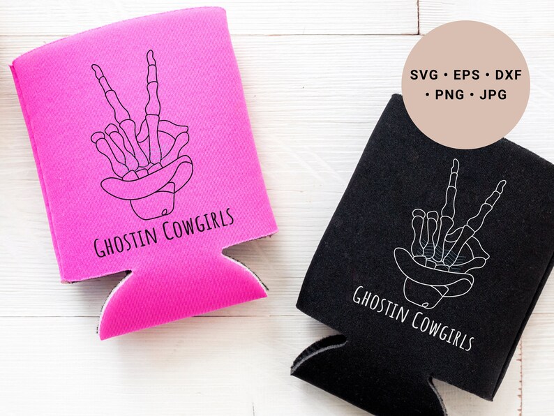 May include: Two black and pink can coolers with a skeleton hand making the peace sign wearing a cowboy hat. The text on the coolers says "Ghostin Cowgirls".