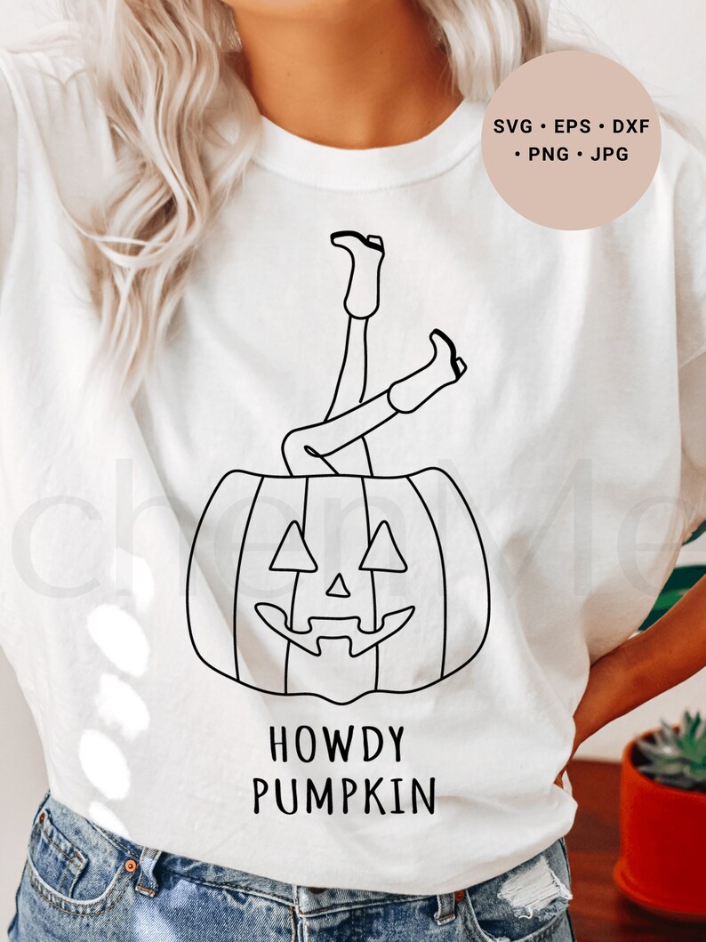 May include: White t-shirt with a black line drawing of a pumpkin with legs sticking out of the top. The text "Howdy Pumpkin" is below the pumpkin.