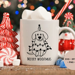 May include: White ceramic mug with a black and white illustration of a dog wearing a Christmas tree costume. The text "Merry Woofmas" is printed below the illustration. The mug is surrounded by candy canes, marshmallows, and a small Christmas tree.