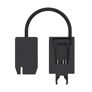 May include: A black electronic adapter featuring a rectangular housing on the left and a specialized port connector on the right, joined by a flexible black cable. The right component includes a circular clip-like attachment at the bottom edge.