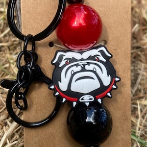 Ga Bulldogge Schlüsselanhänger mit roten und schwarzen Perlen