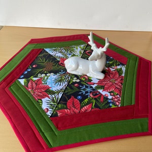 Patchwork hexagon table topper Christmas Handmade table linen Quilted Christmas center piece Red green black white poinsettia
