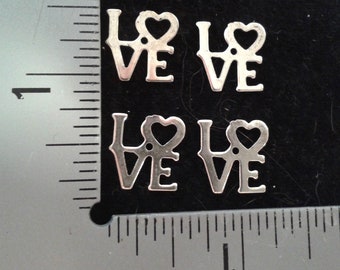6 SILVER LOVE CHARMS. Two Pairs