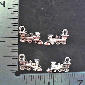 4 Locomotive Charms. Antique Silver.  2 Pairs.