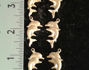 6 DOUBLE DOLPHIN CHARMS. Raw Brass . With Ring. 3 Pairs..