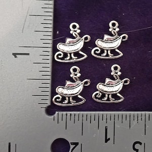 4 SANTA&#39;S SLEIGH CHARMS. Antique Silver. With Ring. Pack of 4.