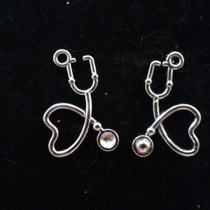 Price Reduced: 8 NURSE or DOCTOR STETHOSCOPE  Heart Charms. Silver Tone, 4 pairs.