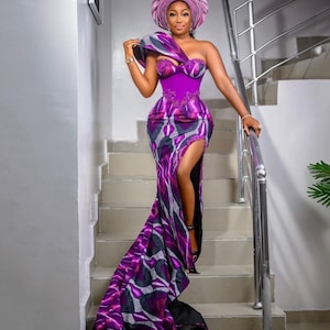 purple kente dress Gorgeous in purple #bride #kente #kentestyle #wedding #ghanaianweddings  Kente outfit:nateki_couture #fyp #viral #ghanatiktok  #nigeriantiktok
