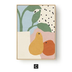May include: Abstract art print featuring a still life composition. The artwork includes a white vase with green leaves, two yellow pears, and an orange fruit against a backdrop of blue, pink, and dotted patterns. The print is framed in a gold-colored frame.
