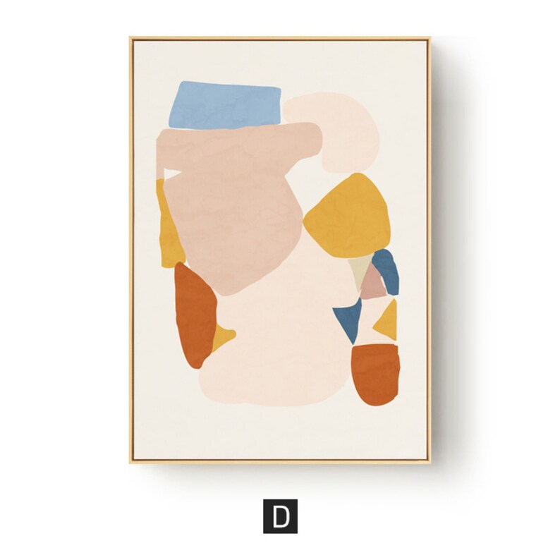 May include: Abstract art print featuring a collection of organic shapes in muted colors. The artwork includes shapes in shades of blue, pink, yellow, and brown, set against a cream background. The print is framed in a gold-colored frame, with the letter "D" in the bottom corner.