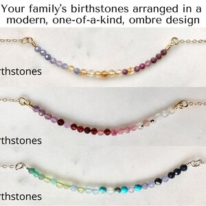 May include: Three gold necklaces with birthstones arranged in an ombre design. The top necklace has three birthstones, the middle necklace has four birthstones, and the bottom necklace has six birthstones.