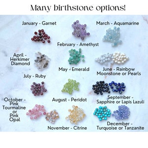 May include: Image showcasing various birthstone options, including garnet, amethyst, aquamarine, emerald, ruby, peridot, sapphire, citrine, and turquoise. The text "Many birthstone options!" is at the top.