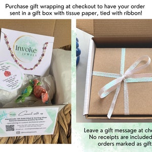 May include: A gift box with a white ribbon tied around it. The box is filled with tissue paper and a small red and gold necklace. The box is labeled "Invoke Jewels". The text "Leave a gift message at checkout! No receipts are included with orders marked as gifts." is printed below the box.