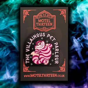 Cheshire Cat - The Villainous Pet Parlour. An Alice in Wonderland inspired eco-friendly wooden pin badge