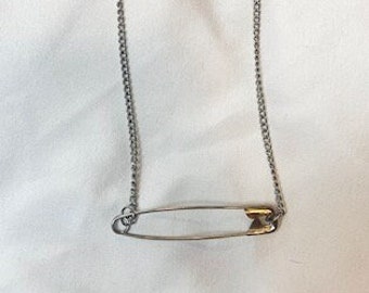 close pin silver necklace