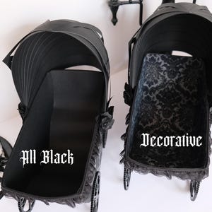 May include: Two black miniature carriages, one with a solid black interior and the other with a decorative patterned interior. The text "All Black" and "Decorative" are visible. The carriages have wheels and a canopy.