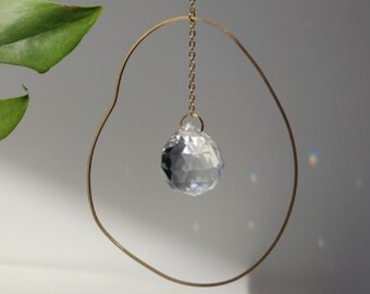Suncatcher NEBULA : Crystal & Brass Minimalist Window Hanging, Handmade in France | Add a touch of gentle light to your decor