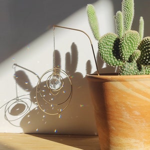 SATELLITE • Brass & crystal plant suncatcher • Solar indoor plant decor • Minimalist rainbow prism • Zen gift for plant lovers